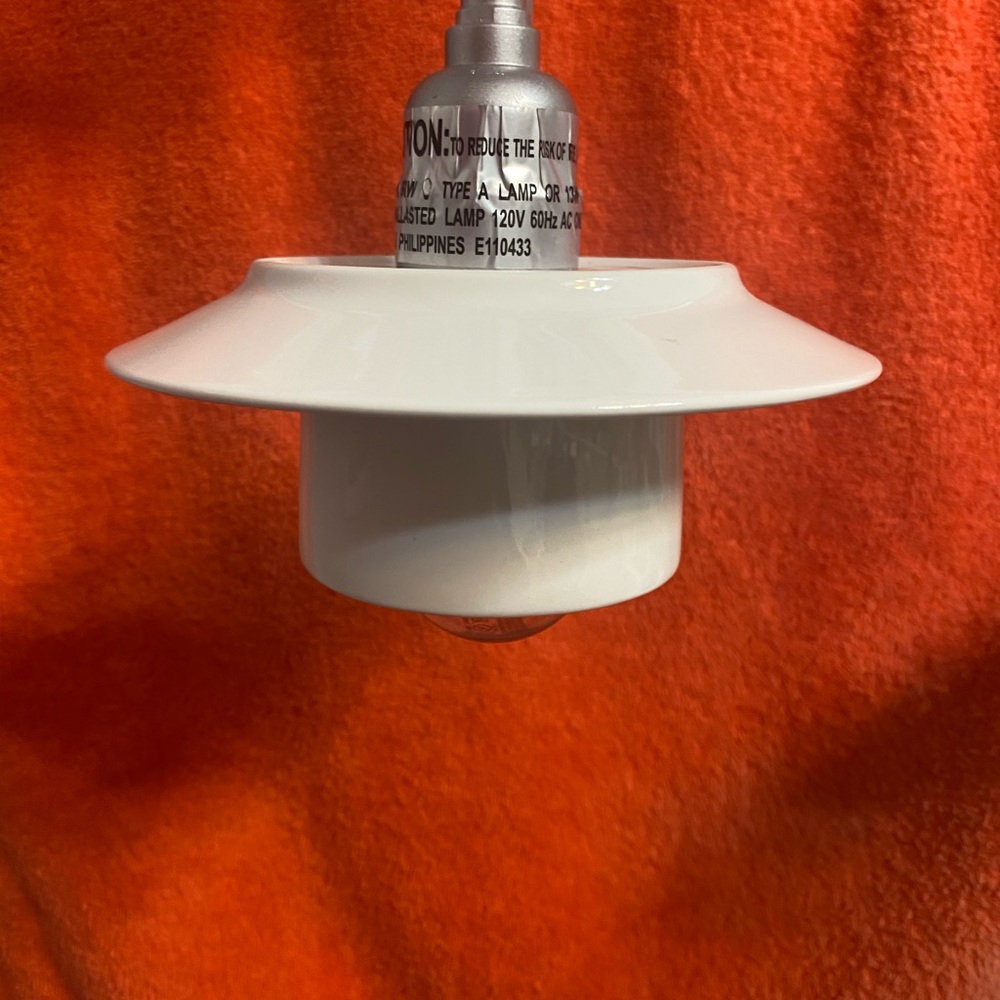 Tea cup pendant lights.  Great for a kitchen.